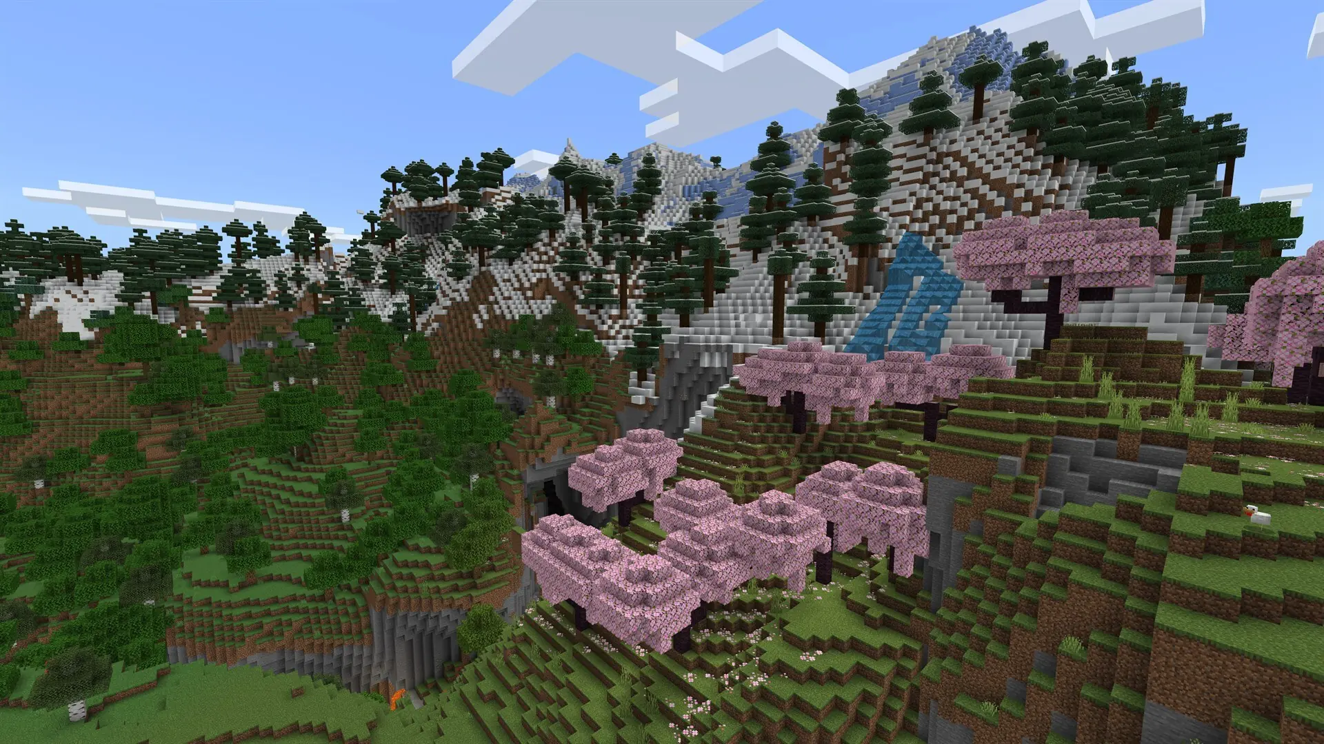 Zalesione wzgórza i kwitnące wiśnie w świecie gry Minecraft