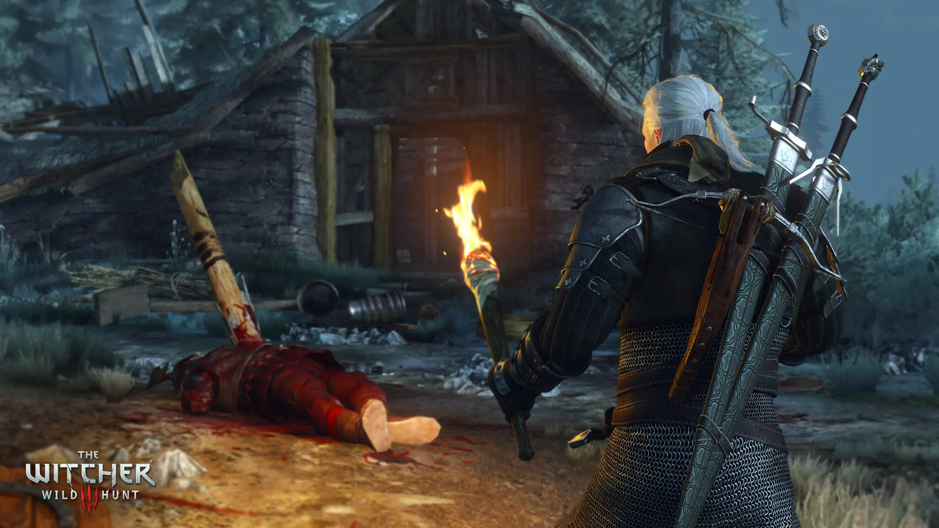 Geralt z pochodnią pochyla się nad ciałem przy drewnianej chacie nocą w grze Wiedźmin 3: Dziki Gon