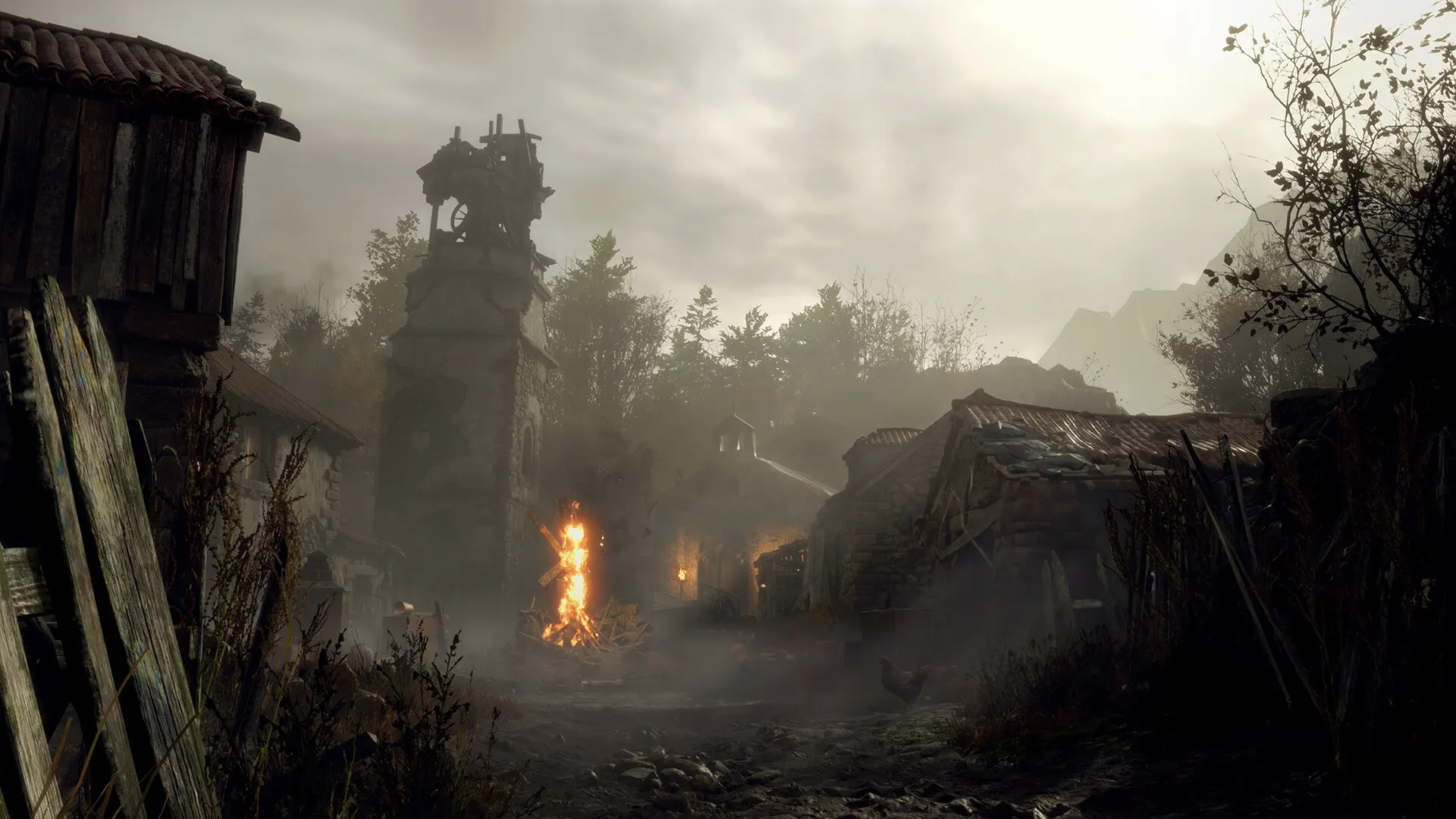 Resident Evil 4, mglista wioska z płonącym ogniskiem